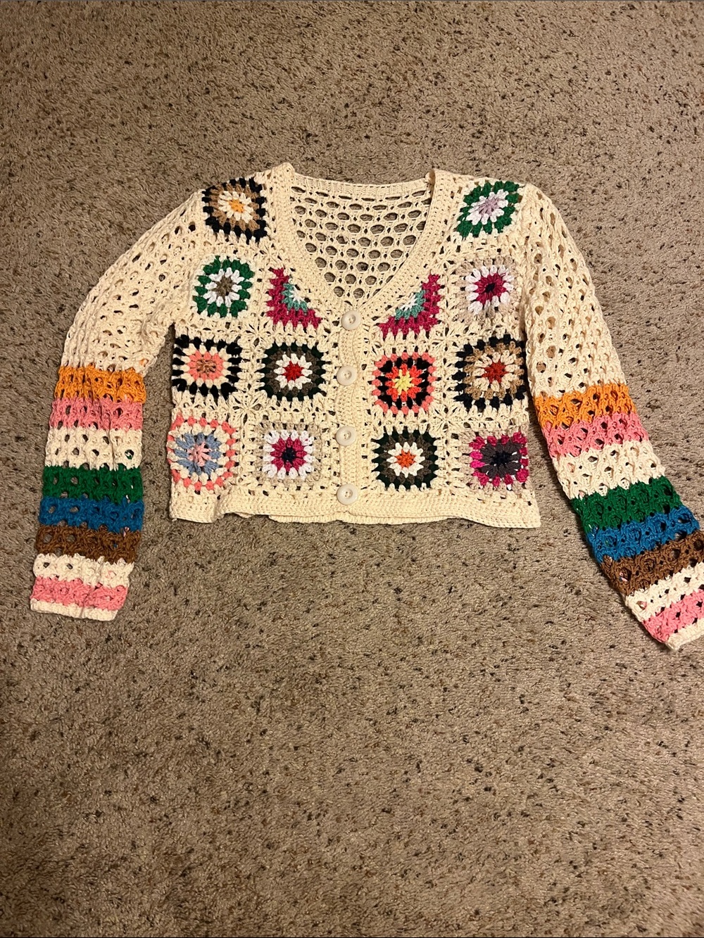 Misses open knit cropped sweater. Multi color design, button front.